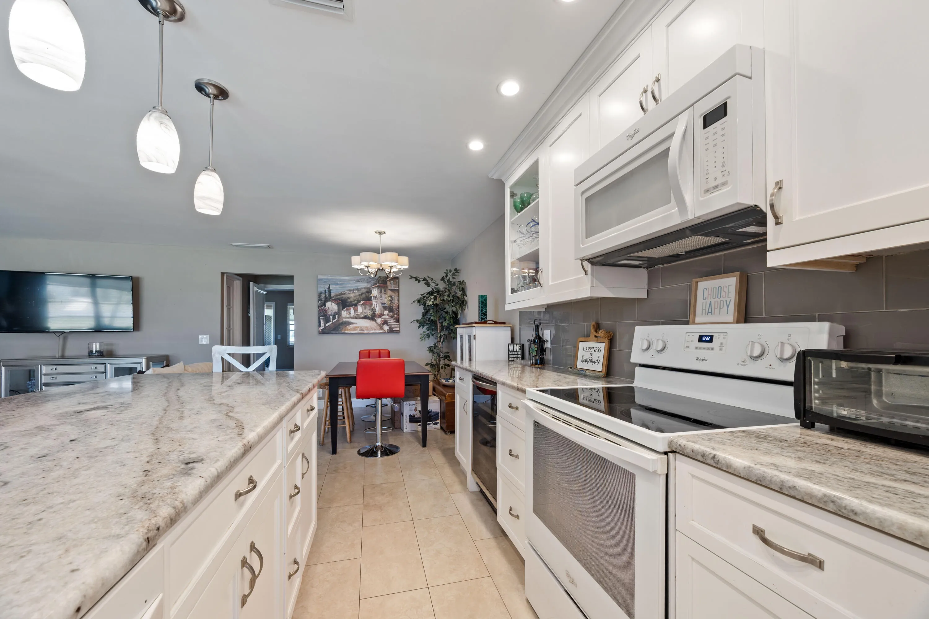 Tons of Cabinetry plus a wine fridge.