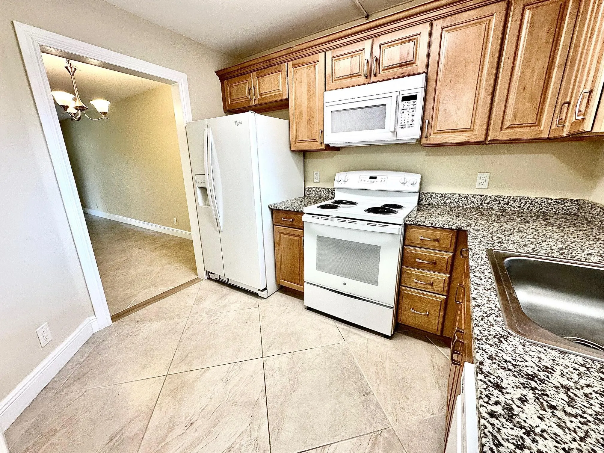 Wall between the kitchen and the living area opened up for a more spacious feel