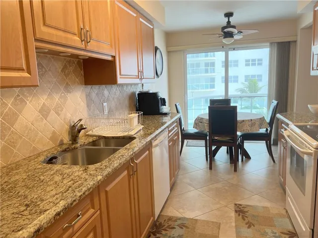 RENOVATED KITCHEN WITH GRANITE COUNTER TOPS