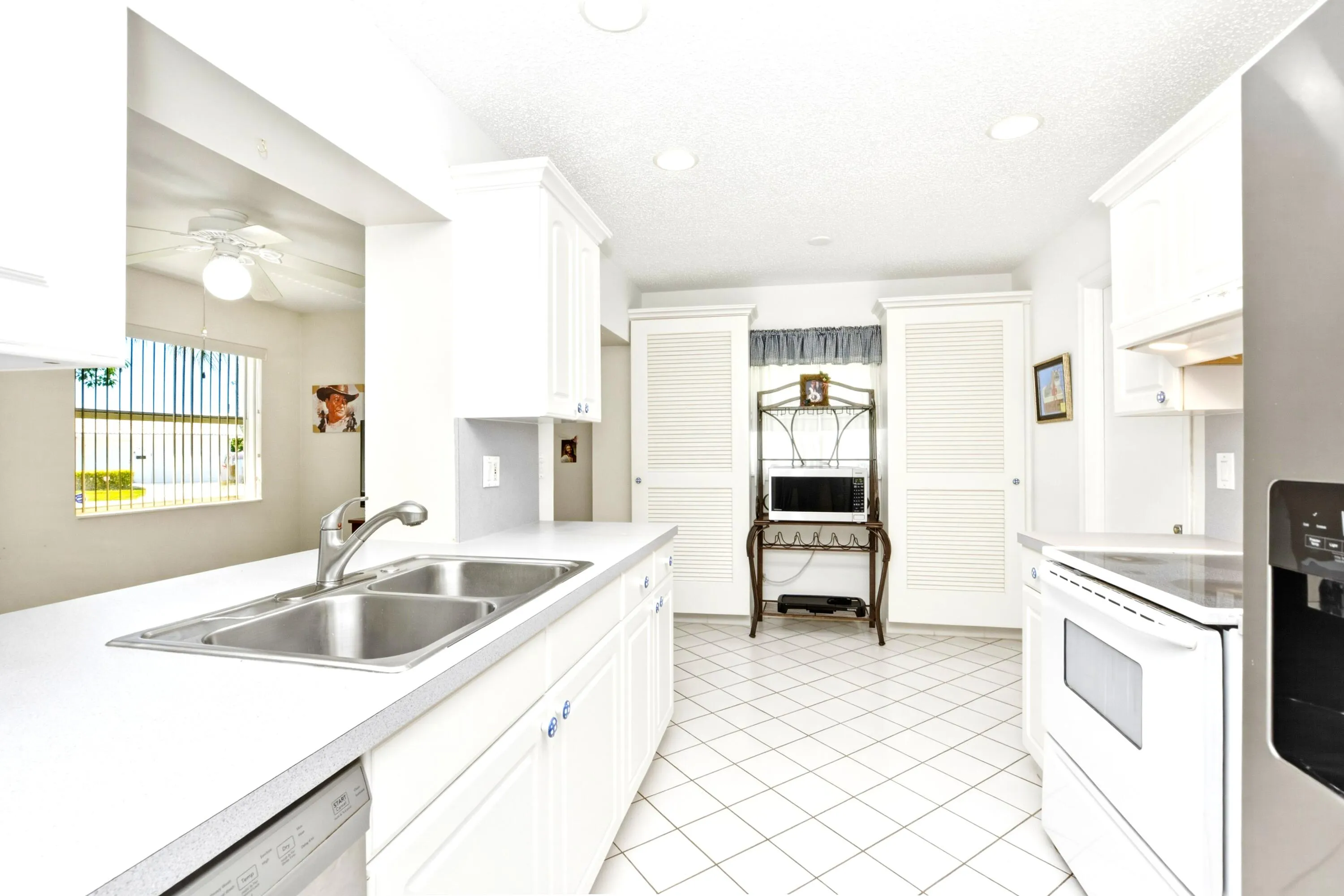 Updated kitchen with extra cabinetry and updated appliances.