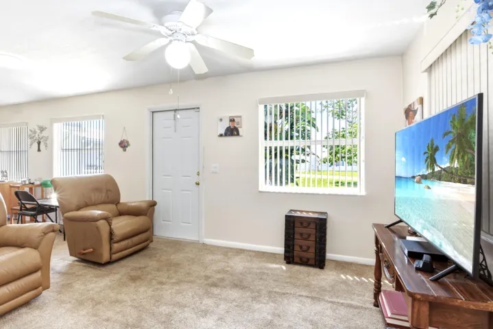 Florida room with access door to back patio.