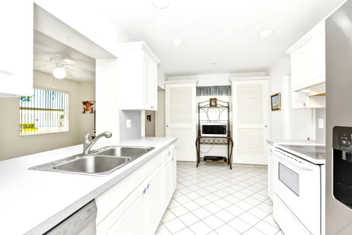 Updated kitchen with extra cabinetry and updated appliances.