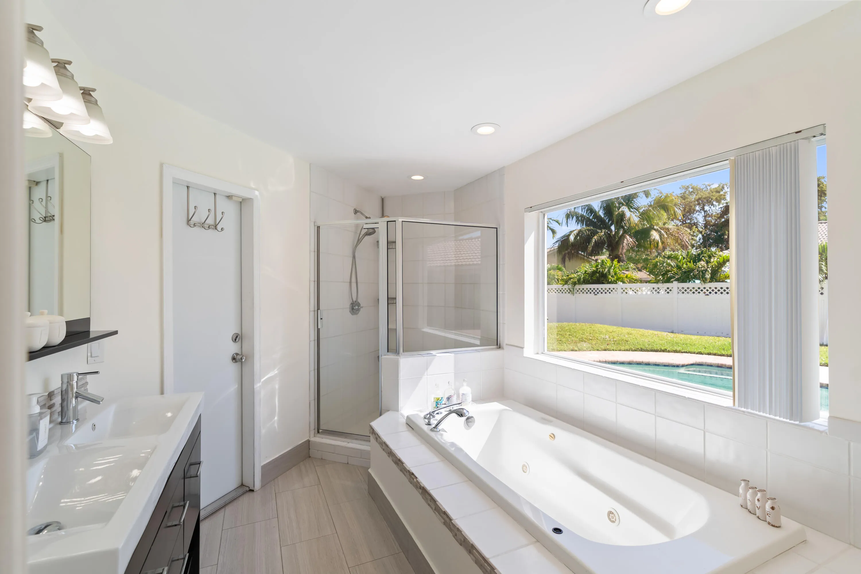 Primary en-suite bathroom with with exit to garden and outdoor shower