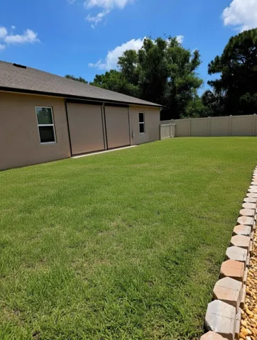 Private fenced yard with plenty of outdoor living space