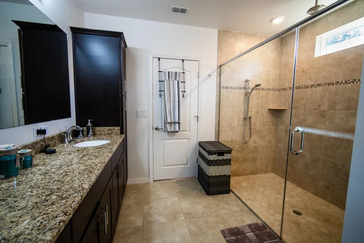 Spa style primary bath with walk in shower