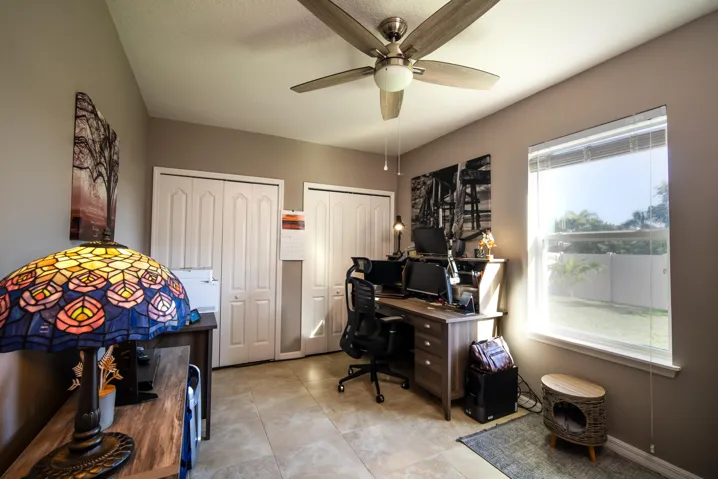 Spacious secondary bedroom/office with fullhome tile