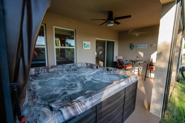 Screened patio and private hottub spa for yearround enjoyment