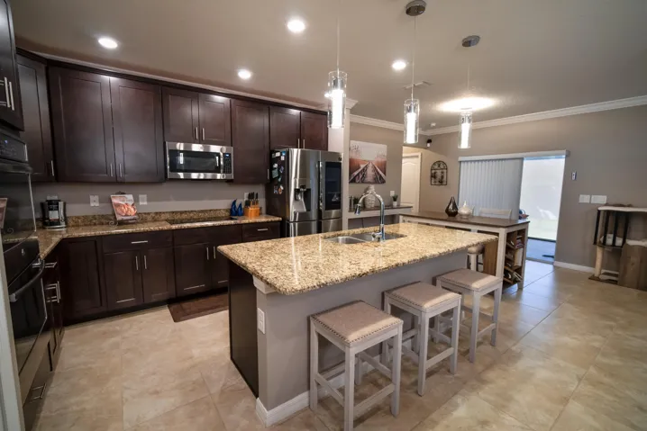 Granite counters, stainless appliances, and upgraded finishes.