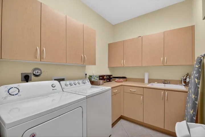 Extra large laundry room with plenty of counter space