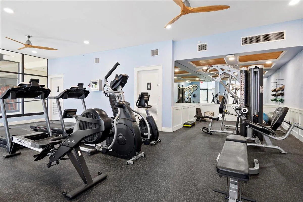 Fitness Room with View to the Pool Deck