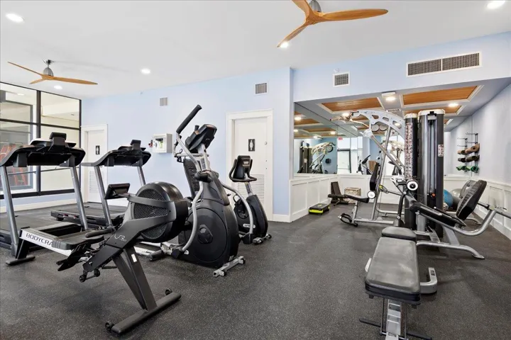 Fitness Room with View to the Pool Deck