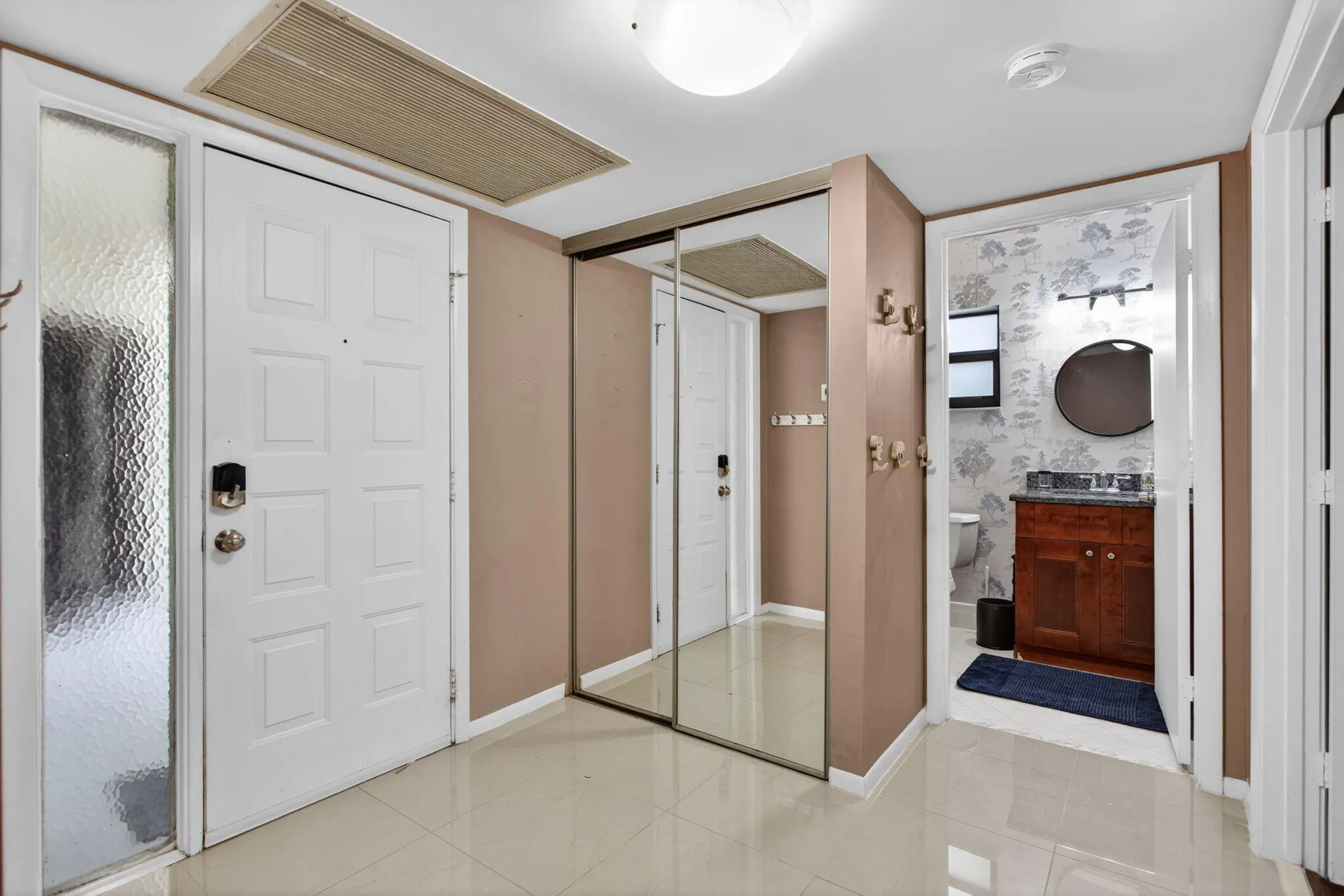 Front entrance is located next to the second bath, great access for guests.