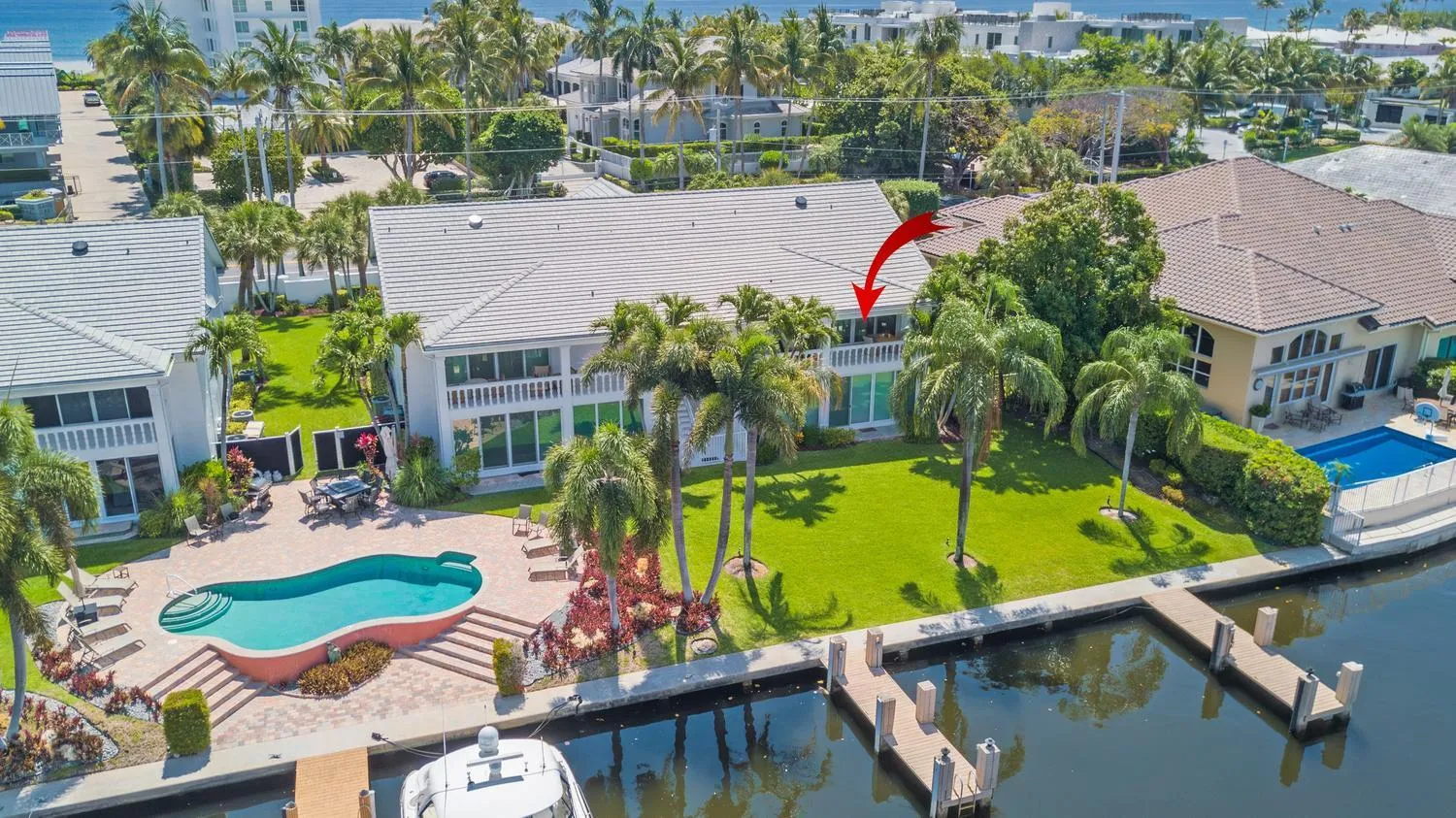 Waterside pool and lounging deck