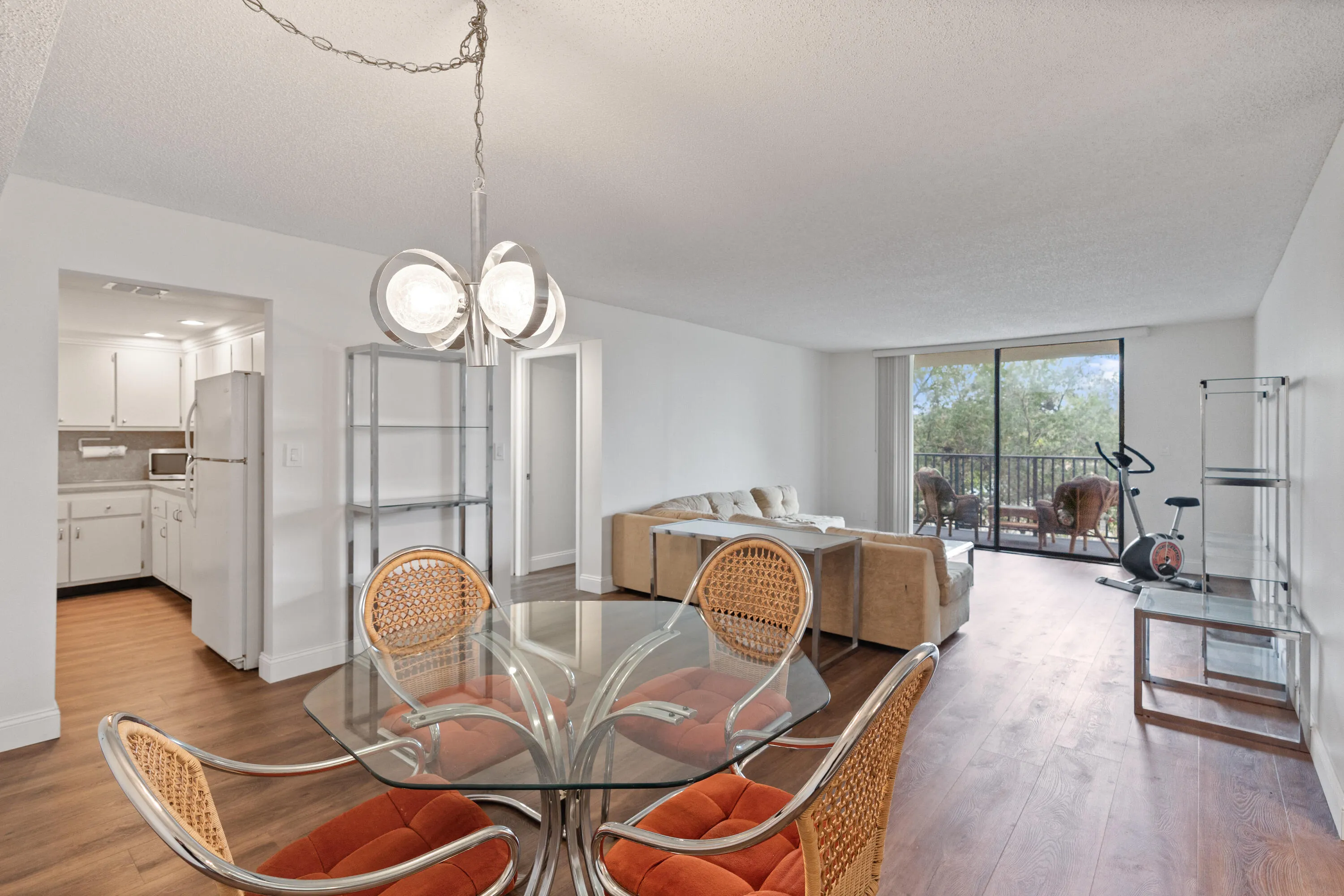 View of kitchen, dining room, and living room.