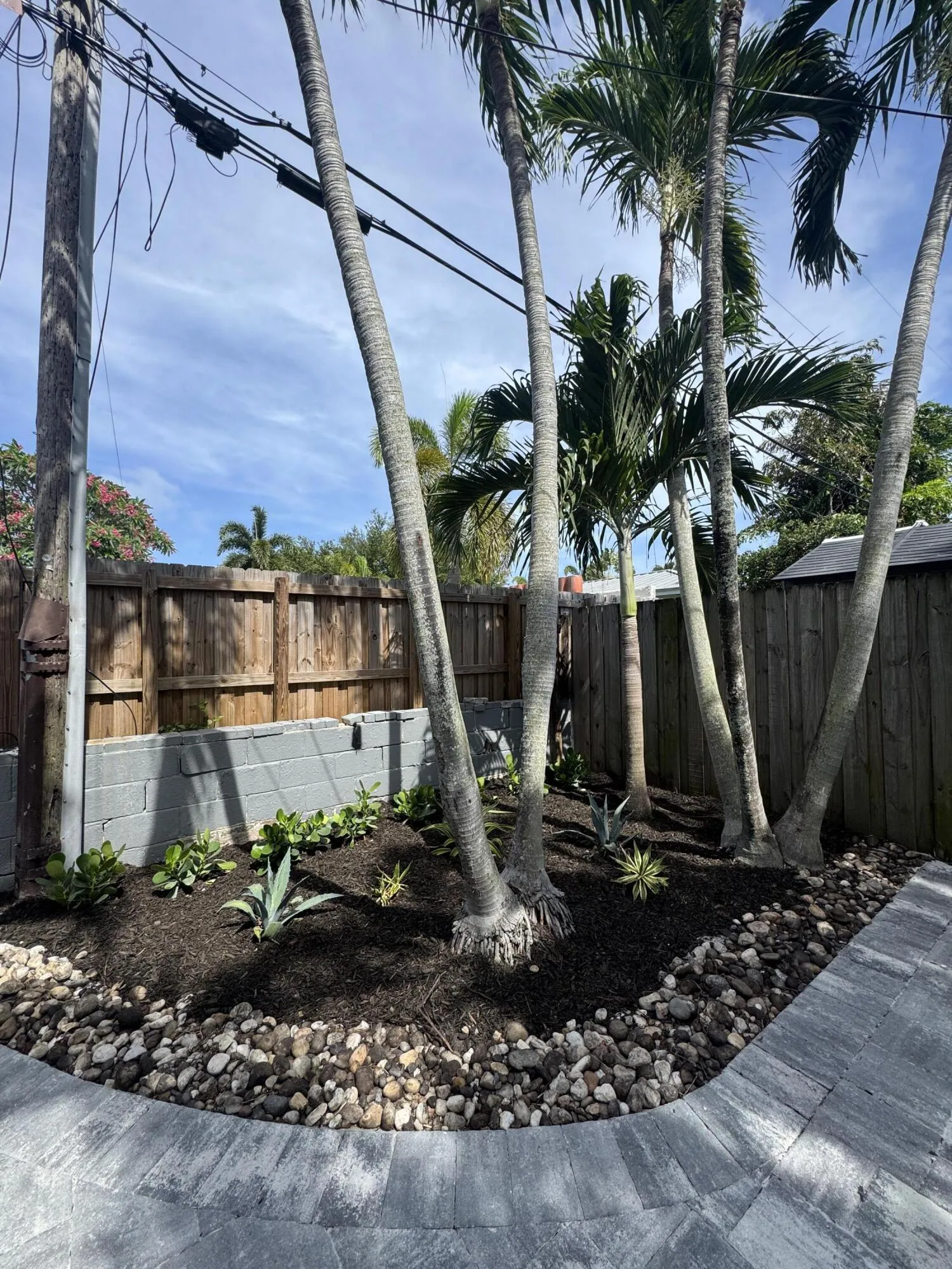 Private fenced in backyard; new pavers and landscaping