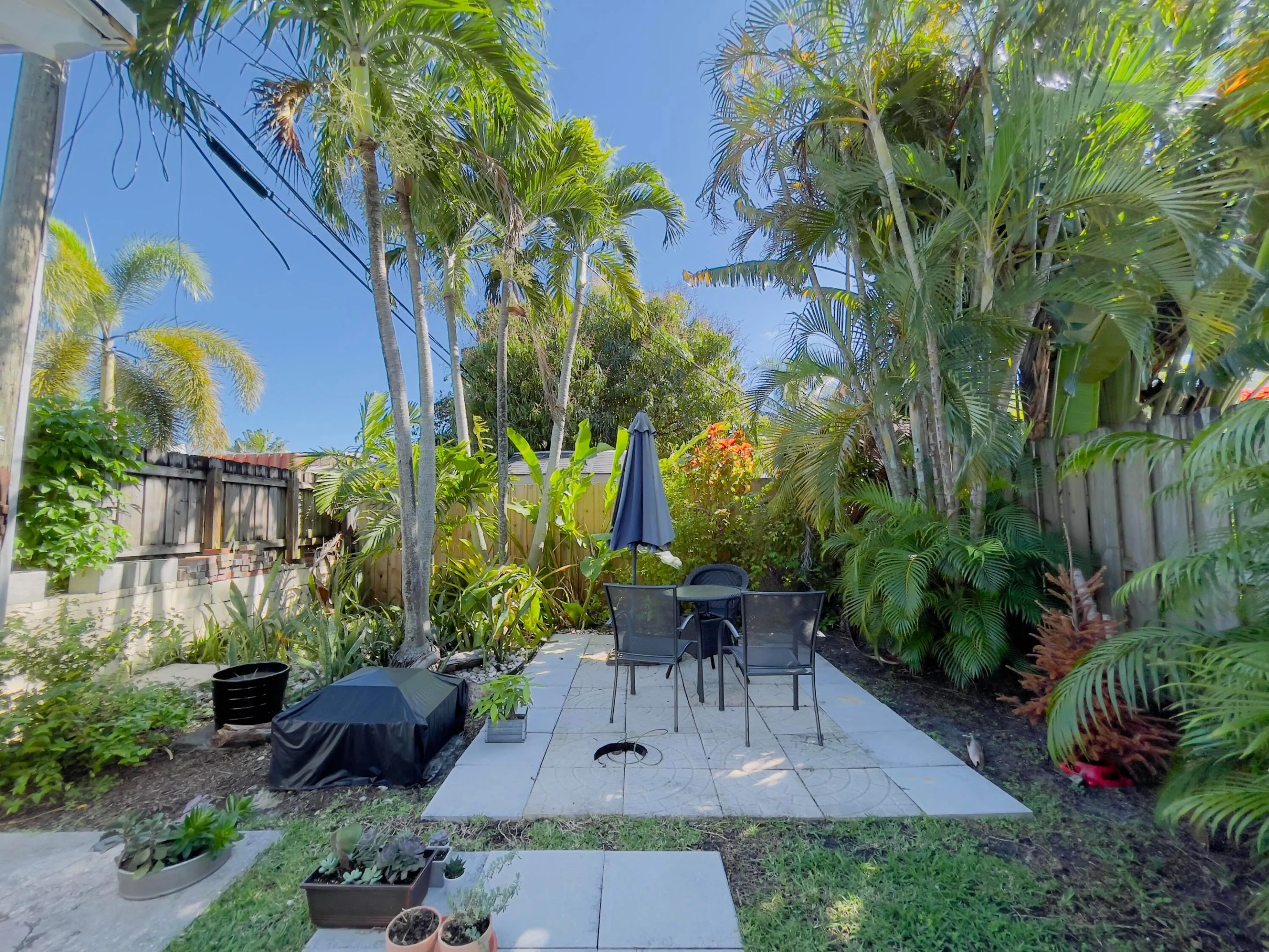 Private fenced in backyard; new pavers and landscaping