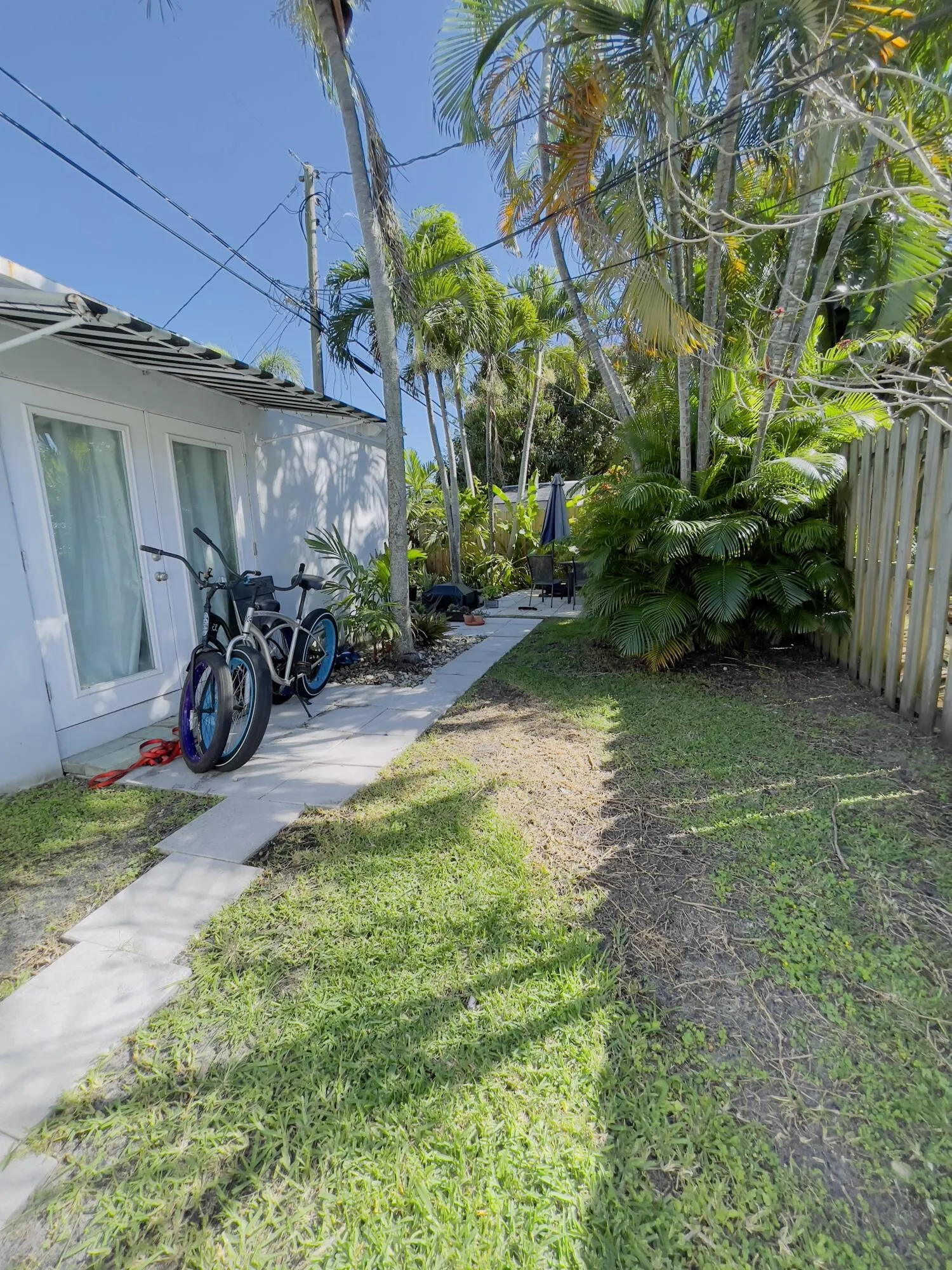 Private fenced in backyard; new pavers and landscaping