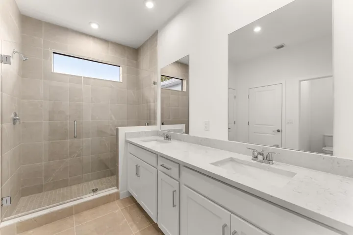 Stock photos represent builder's floorplan