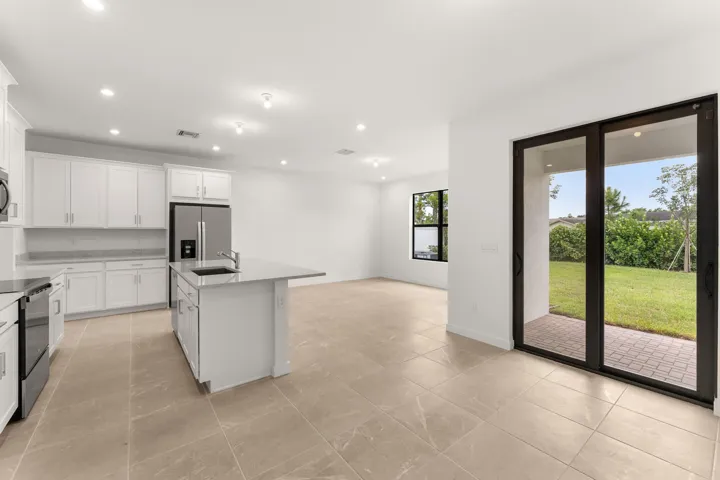 Stock photos represent builder's floorplan
