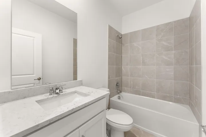 Stock photos represent builder's floorplan