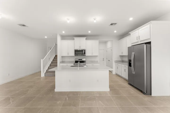 Stock photos represent builder's floorplan