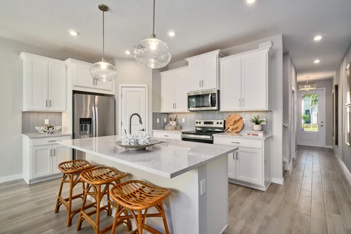 Stock photos represent builder's floorplan