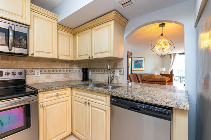 Kitchen with pass-through to dining area