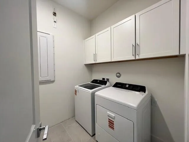 LAUNDRY ROOM WITH UPPER CABINETS