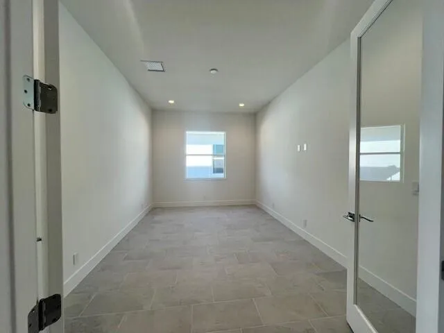 3-CAR TANDEM GARAGE WITH EPOXY FLOORING