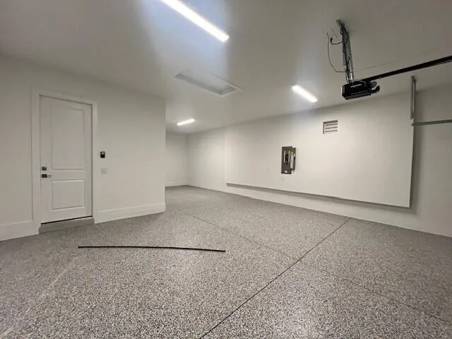 3-CAR TANDEM GARAGE WITH EPOXY FLOORING