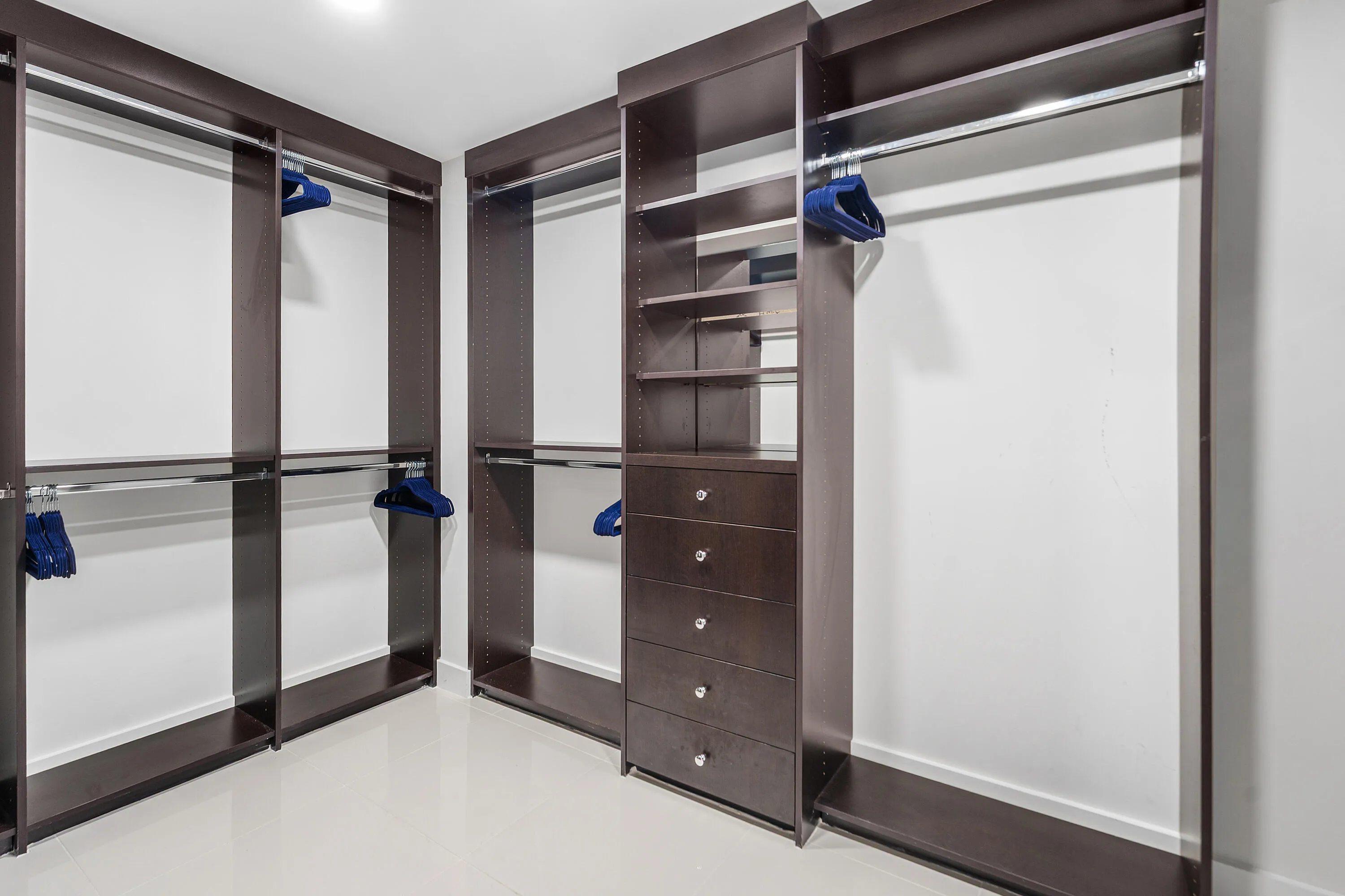 Large Primary Closet with Built Ins