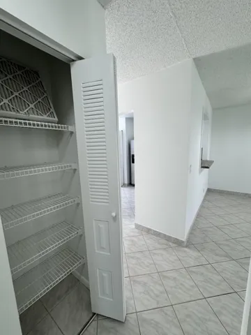 hallway to bdr and bath