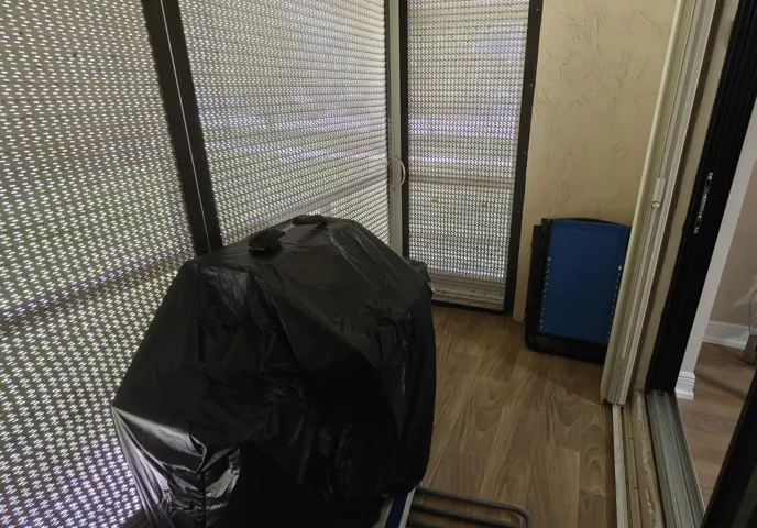 Patio solar roll down screen closed
