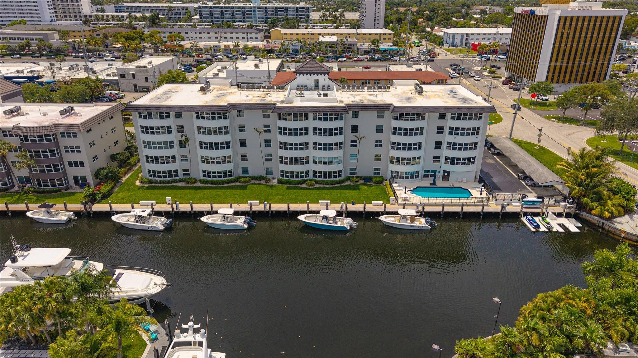 Waterfront boutique building with private dockage and direct ocean access—no fixed bridges.
