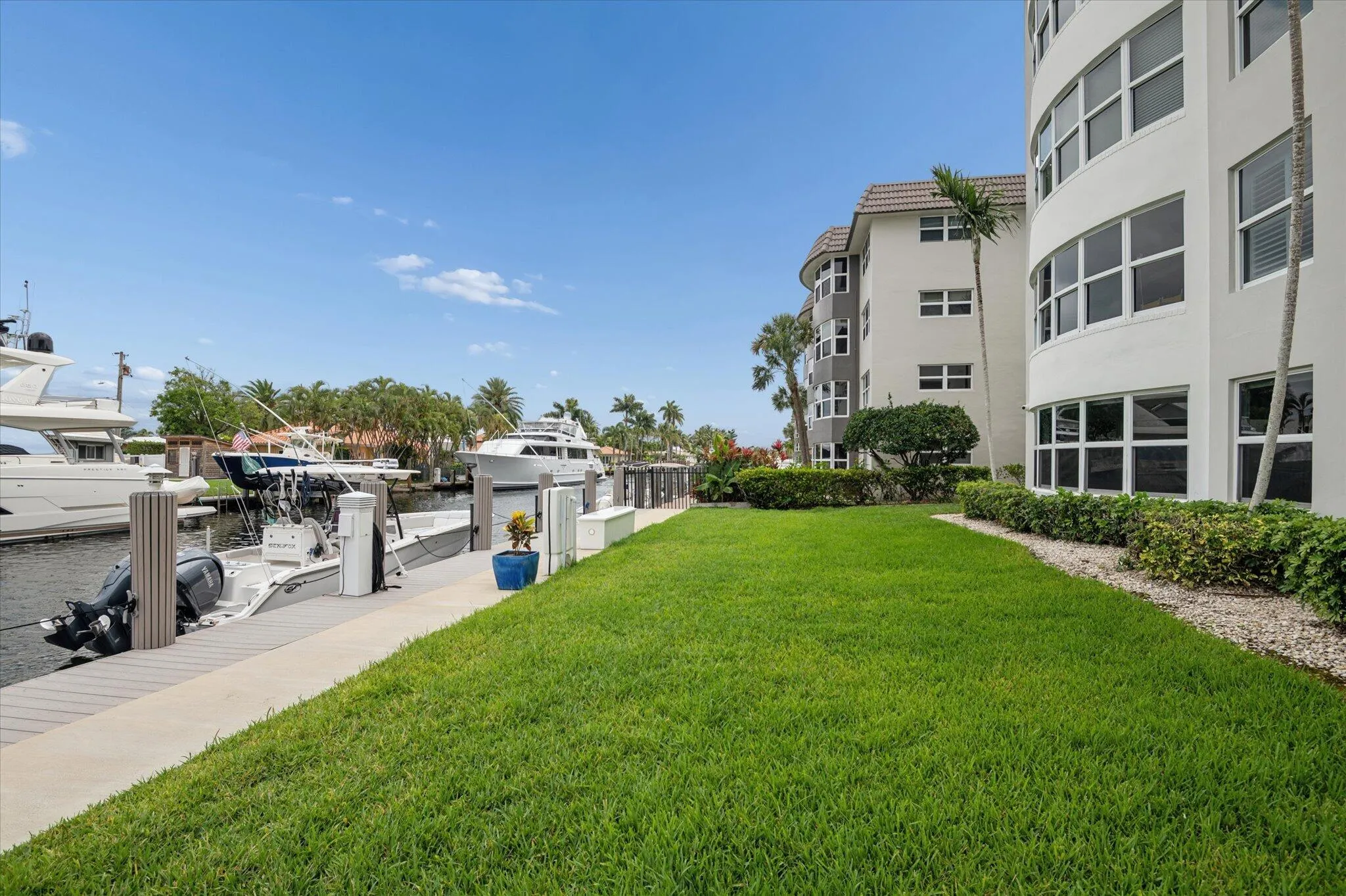 Boutique waterfront building with only 29 residences, featuring a new roof, seawall, and dock—with no assessments on the horizon and direct ocean access with no fixed bridges.
