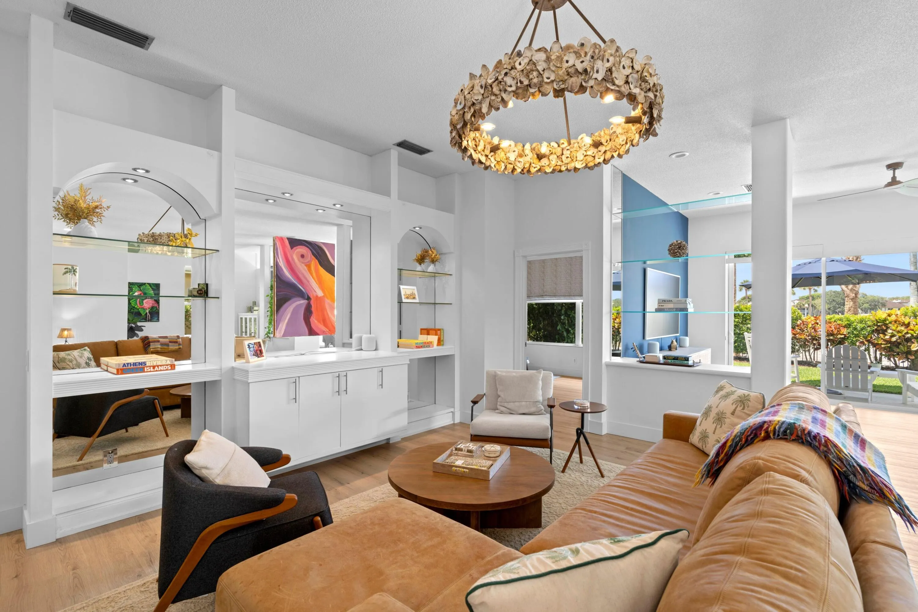 Main living area with volume ceilings and lots of natural light