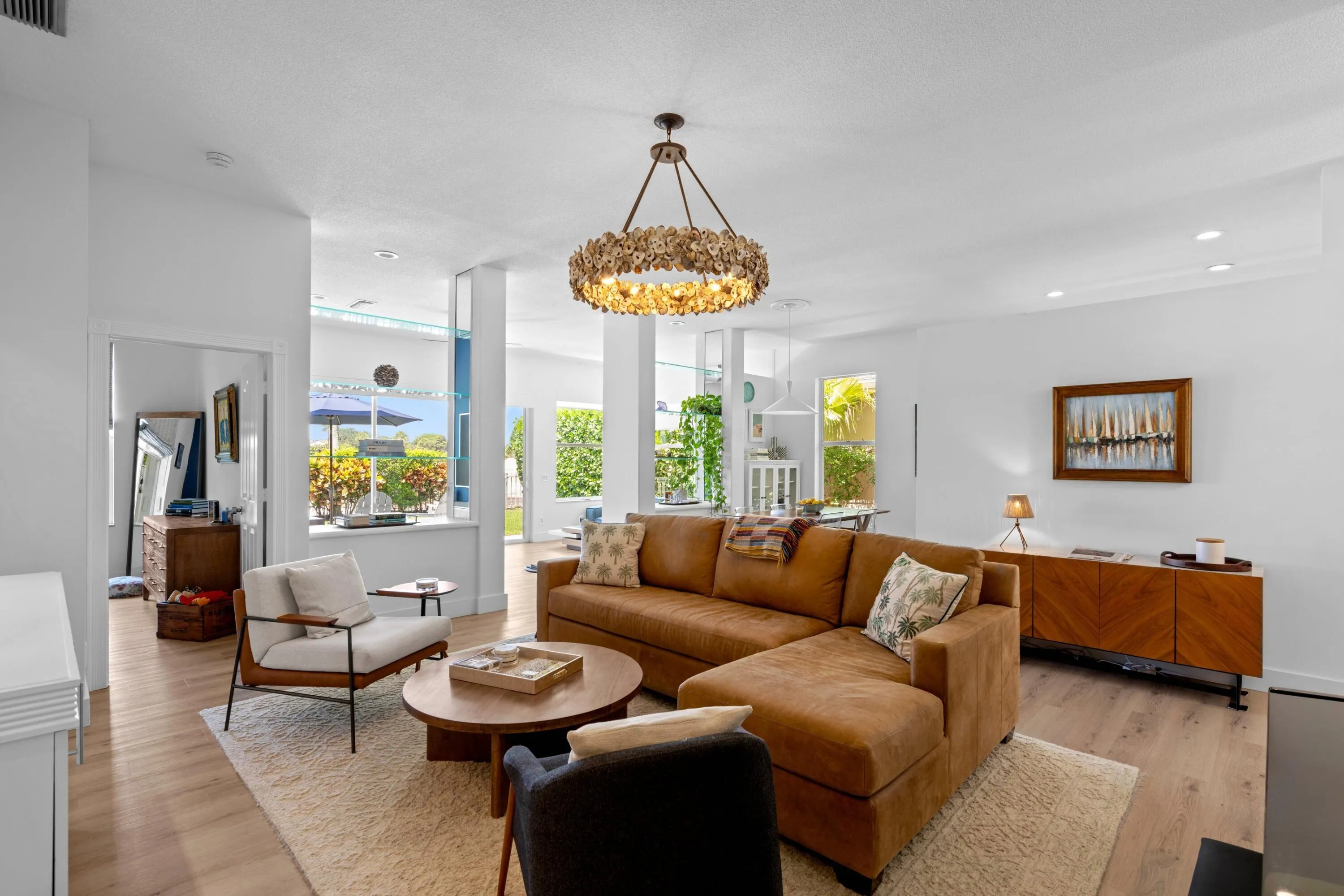 Main living area with volume ceilings and lots of natural light