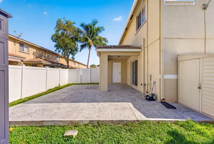 Fully fenced in backyard and deck.