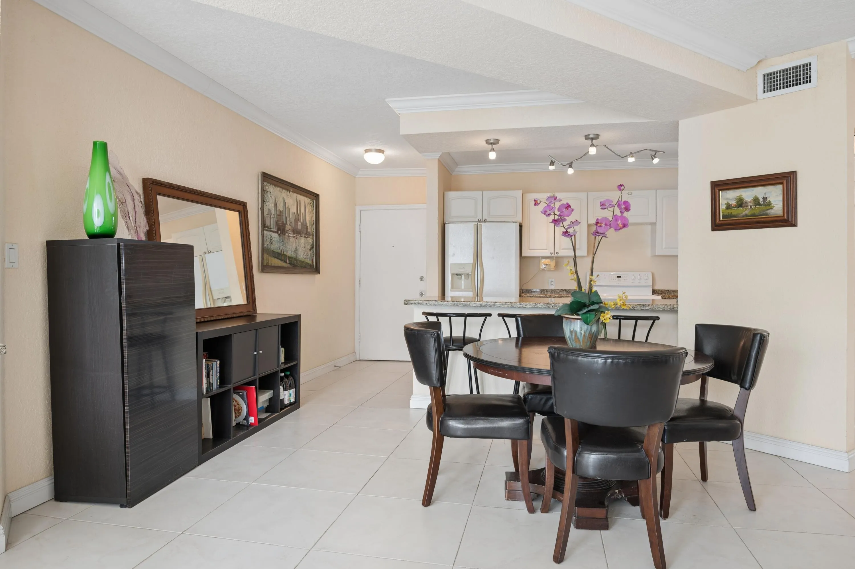 Open kitchen and living space maximize your ocean and Port Everglades views throughout.