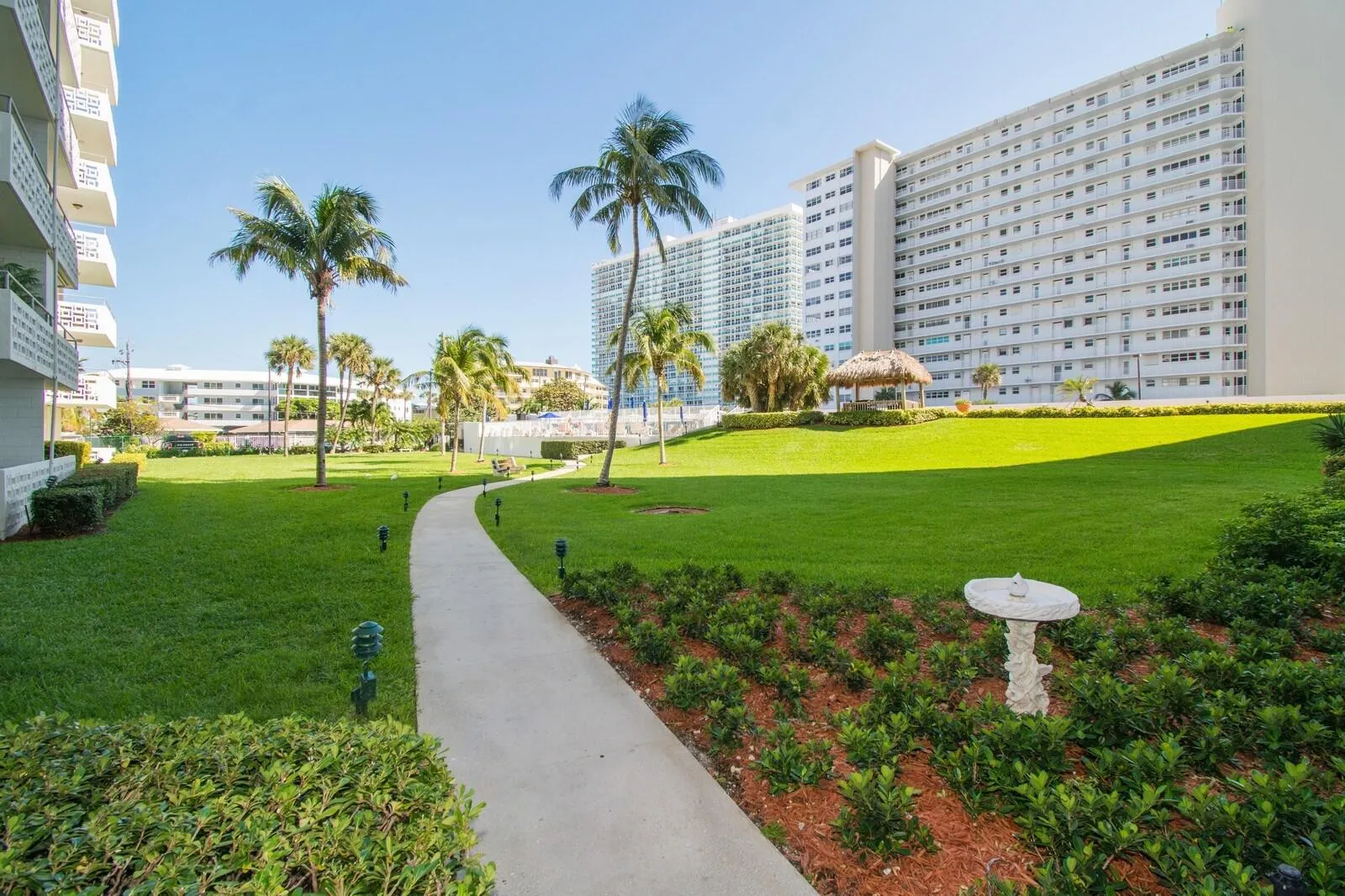 Well maintained grounds leading to your heated pool.