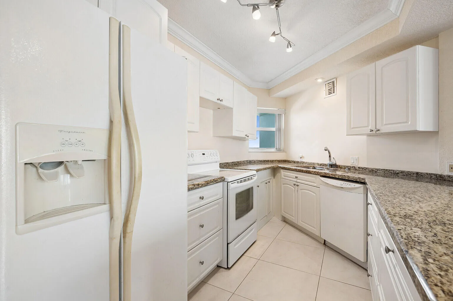 Open kitchen layout allows for maximum views of Lake Mayan and the ocean.