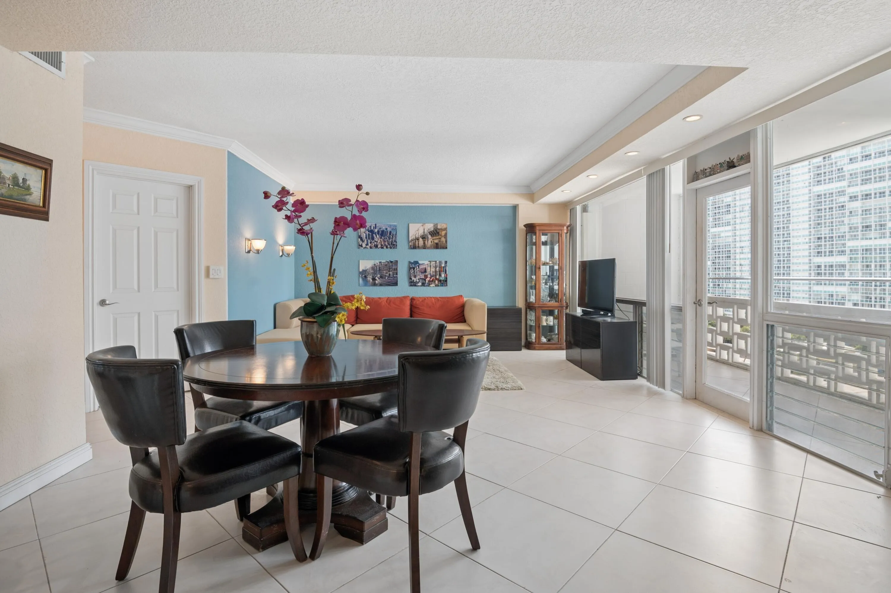 Spacious, bright, living and dinning room with ocean views and views of cruise ships departing and arriving to The Port.