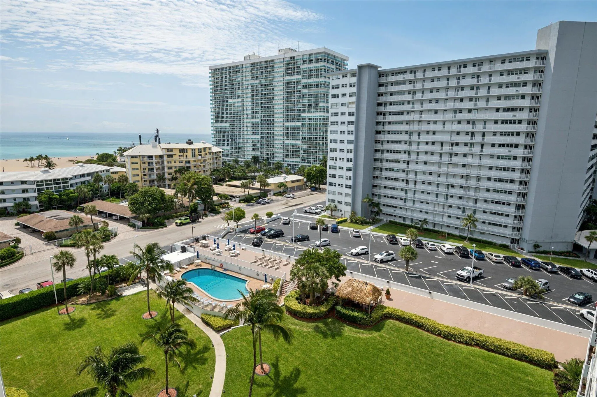 Enjoy views of the ocean and resort style heated pool from your private balcony.