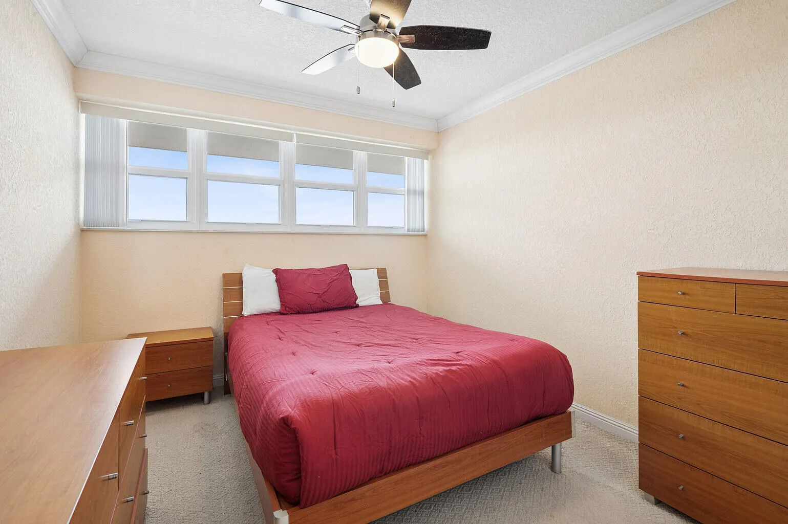 Impact windows in your bedroom provide maximized ocean views and restful nightd.