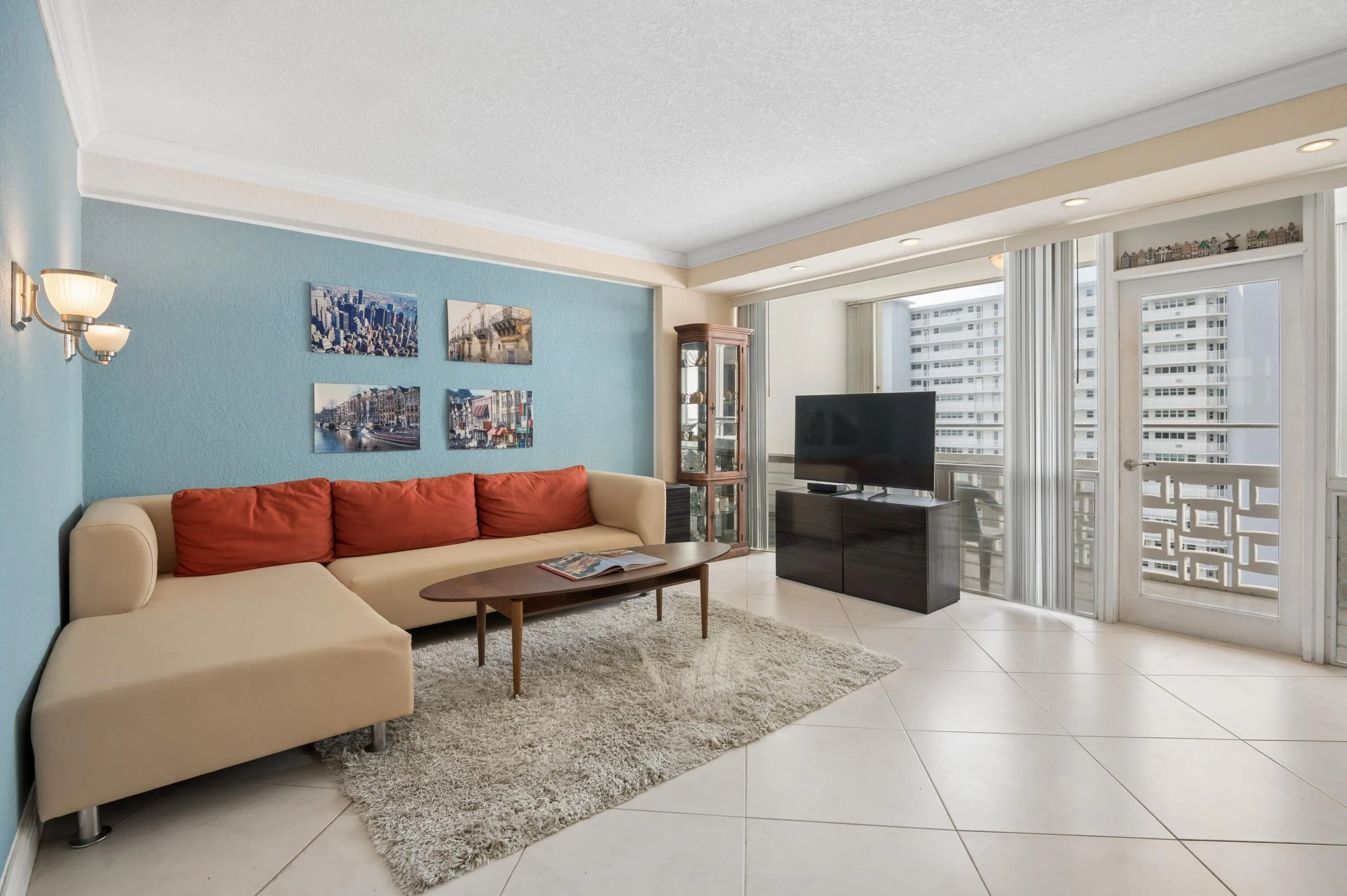Spacious, bright, living room with ocean views and views of cruise ships departing and arriving to The Port.