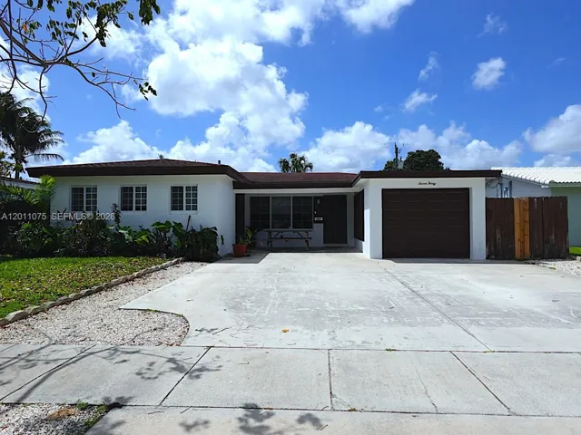 Charming single-family home with spacious driveway and great curb appeal
