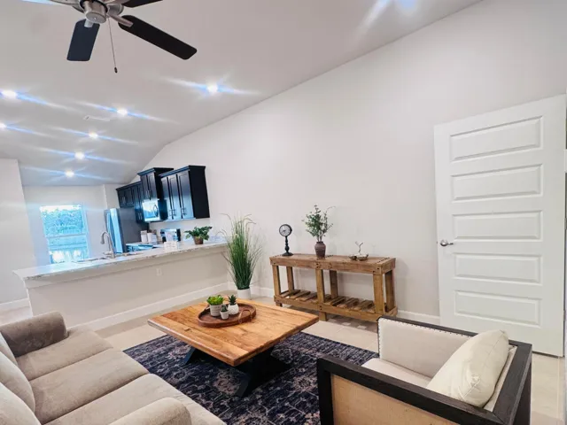Great Room Facing the Kitchen- Model Home. "Finishes may Vary"
