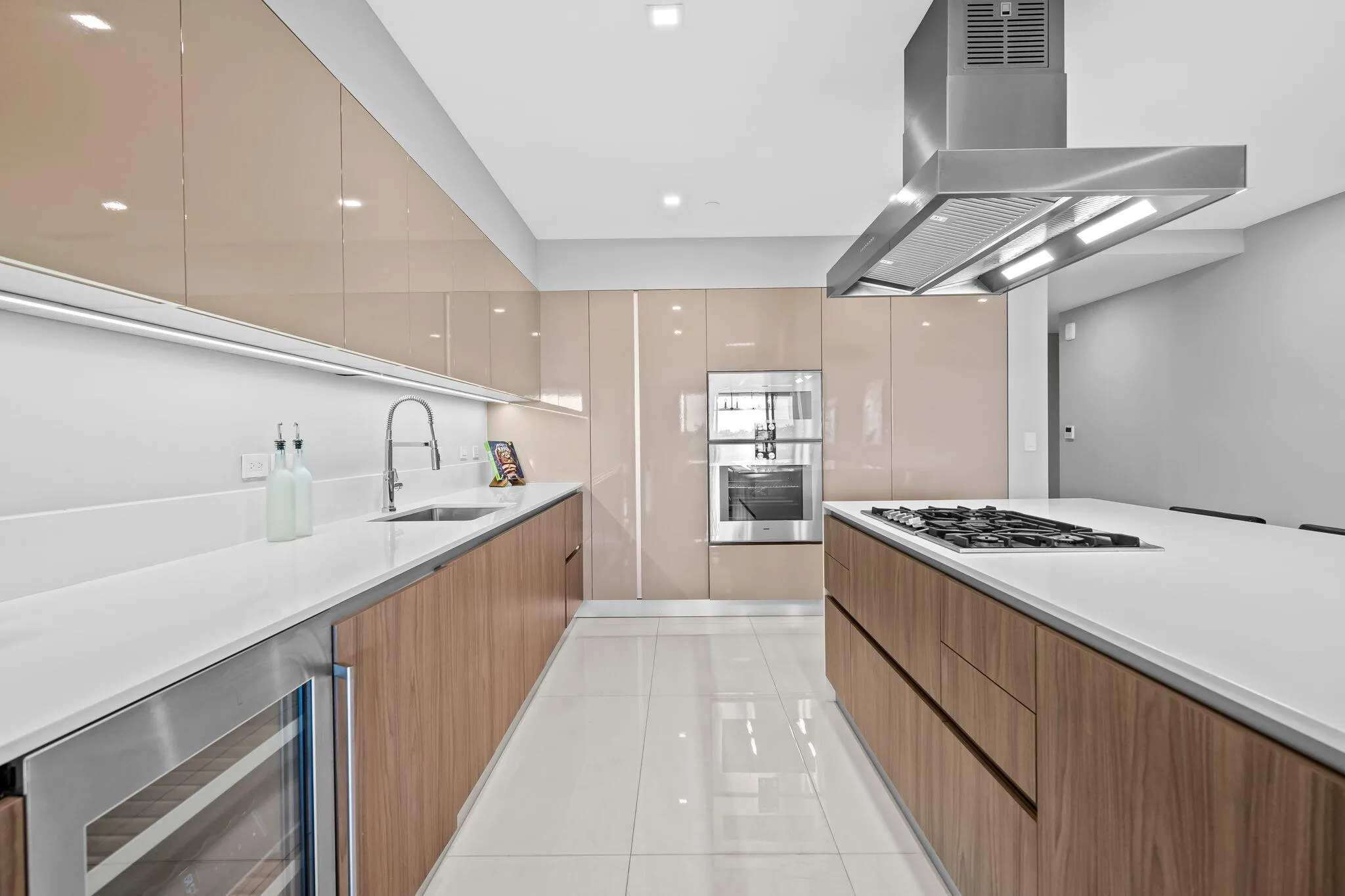 Gas cooktop, Scavolini cabinets, Gaggenau appliances, built-in beverage cooler.