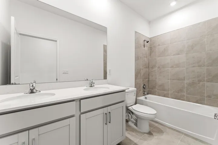 Stock photos represent builder's floorplan