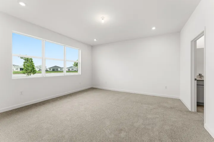 Stock photos represent builder's floorplan